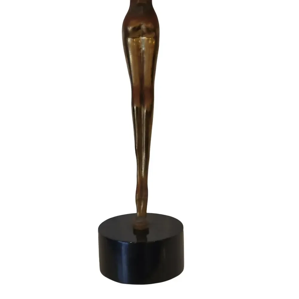 Vintage Mid-Century Modern (MCM) brass sculpture of an elongated female figure